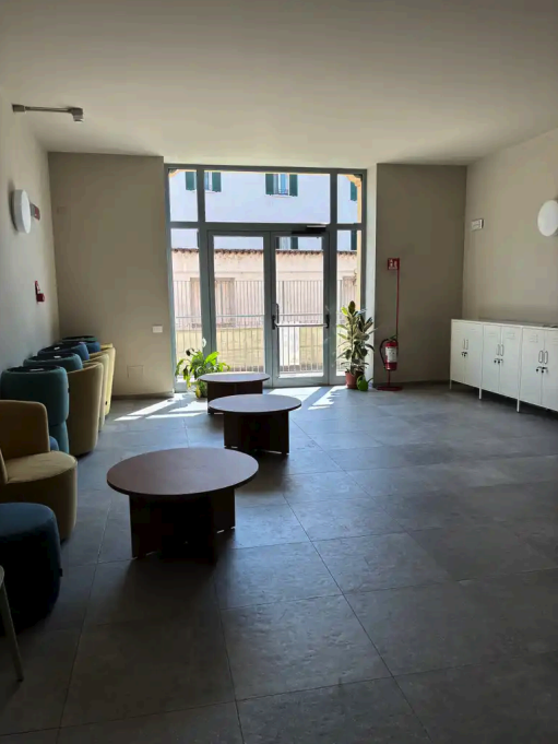 Spazi comuni ostello area salotto